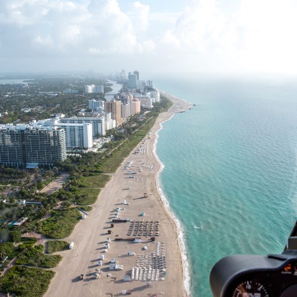 aerial photograph of seashore and buildings