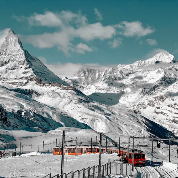 snow covered mountain under blue sky during daytime